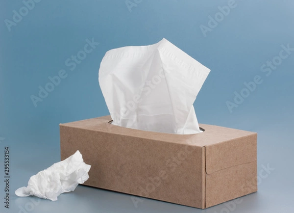 Obraz paper tissue box on blue background