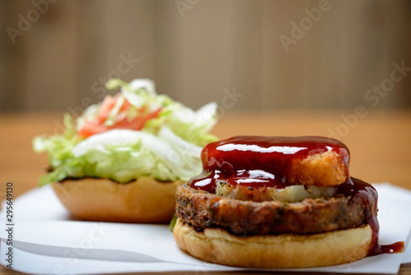 Obraz Veggie burger stack with barbecue sauce and salad