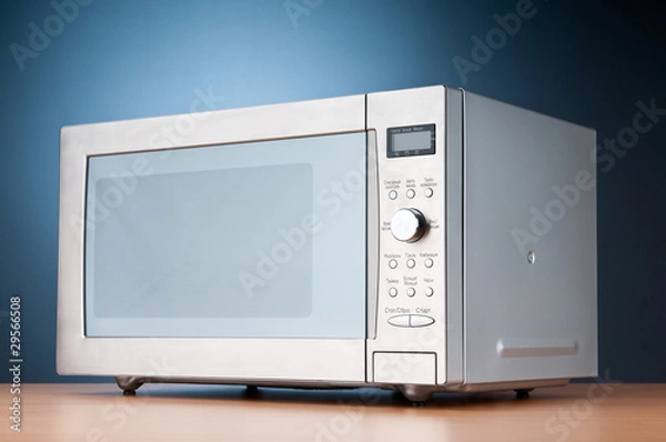 Obraz Piekarnik mikrofalowy na stole