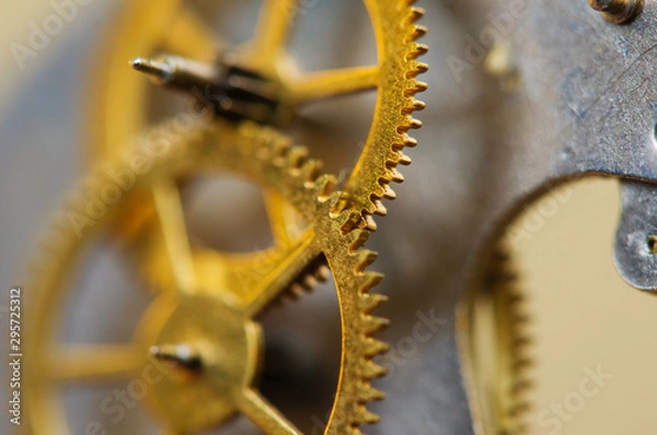 Fototapeta Cog wheels. Yellow gears, clockwork. The concept of time, teamwork, success