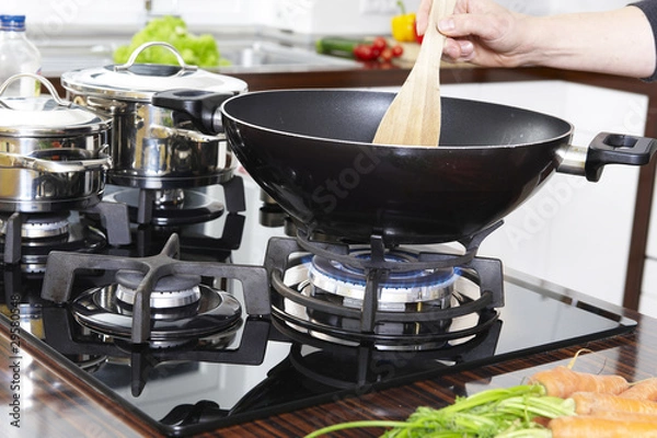 Obraz Cooking with a wok