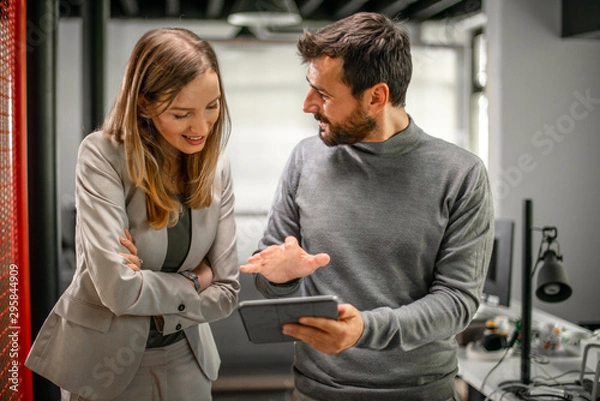 Fototapeta Creative team working at the office	