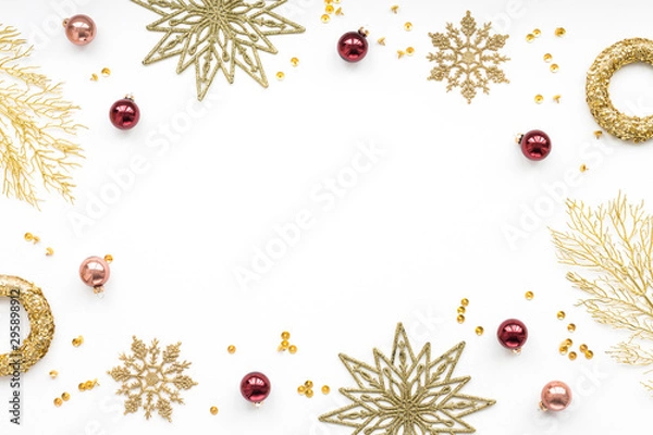 Fototapeta Gold and red christmas decoration on white background, flat lay, top view