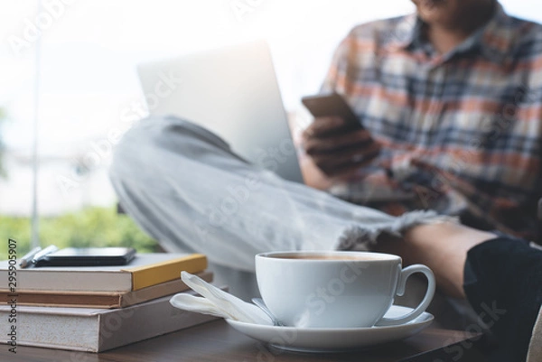 Fototapeta Man working at cafe