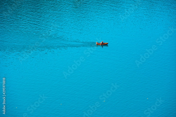 Fototapeta Relaxing rinde with a Boat on water