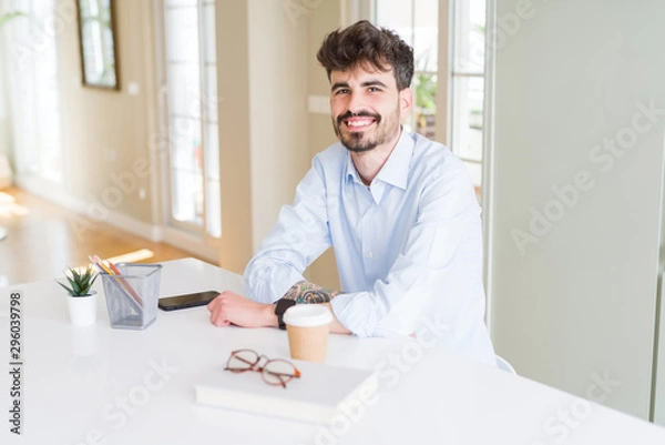 Fototapeta Handsome young man smiling cheerful at the camera with a big smile on face showing teeth