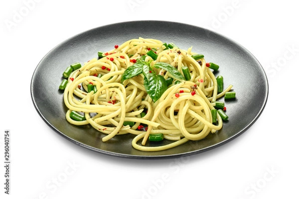 Fototapeta Plate with tasty pasta on white background