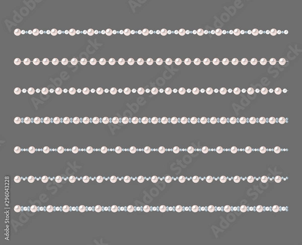 Fototapeta Set of pearl strings isolated on gray background.