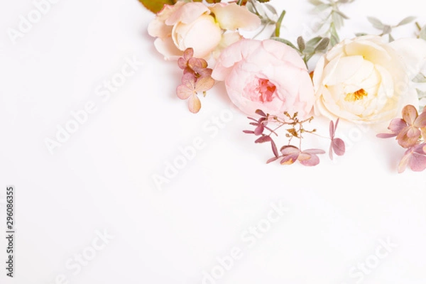 Fototapeta Festive flower composition on the white background. Overhead view