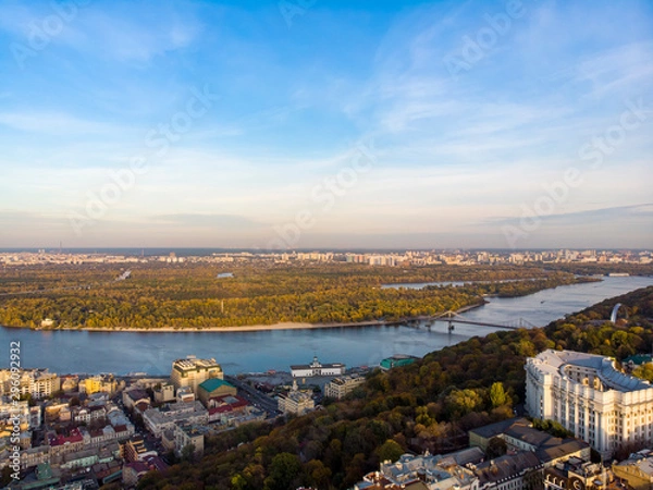 Obraz Aerial top view of Kyiv cityscape, Dnieper river and Podol historical district skyline from above, Kontraktova square with ferris wheel, city of Kiev, Ukraine