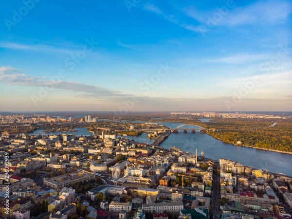 Obraz Aerial top view of Kyiv cityscape, Dnieper river and Podol historical district skyline from above, Kontraktova square with ferris wheel, city of Kiev, Ukraine