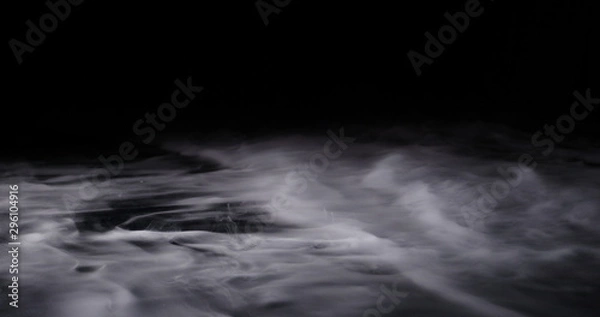 Fototapeta Realistic dry ice smoke clouds fog overlay perfect for compositing into your shots. Simply drop it in and change its blending mode to screen or add.