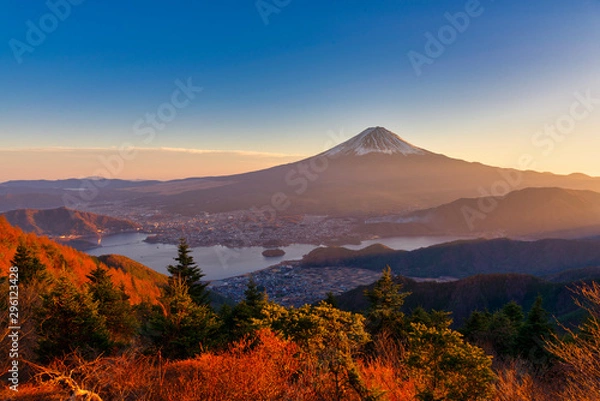 Obraz Aerial view of Mountain Fuji with morning mist or fog at sunrise in Fujikawaguchiko, Yamanashi, Japan. Mountain Fuji and Kawaguchiko lake in early morning seen from Shindo toge view point.