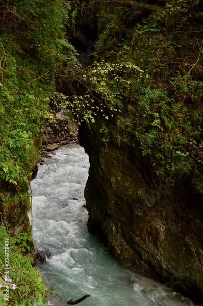 Obraz Waterfall in deep forest of mountains