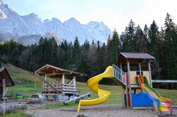Obraz Children playground in park close to mountains