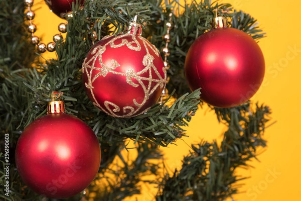 Fototapeta christmas tree decoration detail on color background