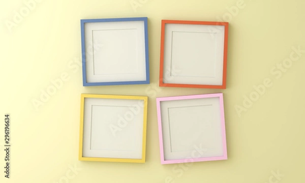 Obraz Blank yellow blue pink and orange picture frame for insert text or image inside on light yellow color wall.