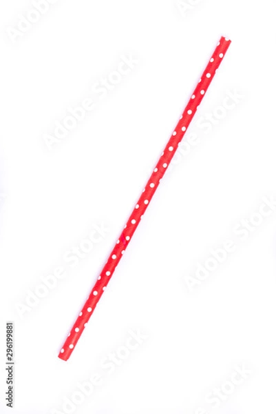 Fototapeta Closeup of drinking straw for party.  Red with white dots. Top view of colorful disposable eco-friendly straw for summer cocktails. Paper coctail colorful straw isolated on white  background, isolated
