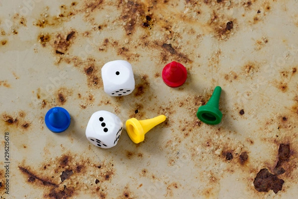 Obraz A few chips for board games on a rusty background.