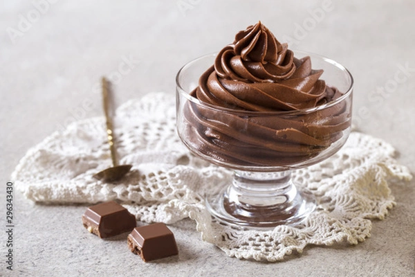 Fototapeta chocolate mousse cream dessert in a glass vase on a light background