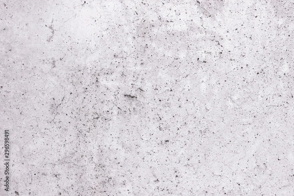 Fototapeta Light gray concrete wall texture with cracks and holes as background.