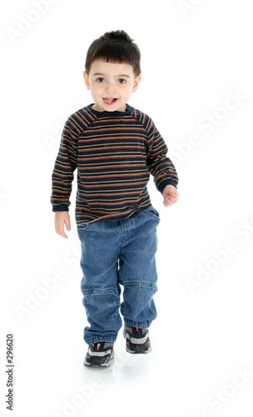 Fototapeta adorable two year old walking over white