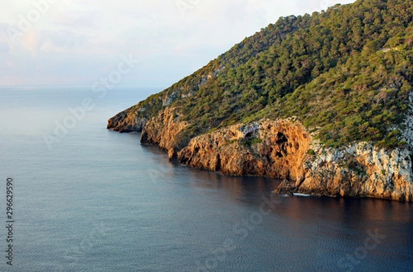 Fototapeta Idyllic coastal area of balearic island Ibiza with wooden cliffs