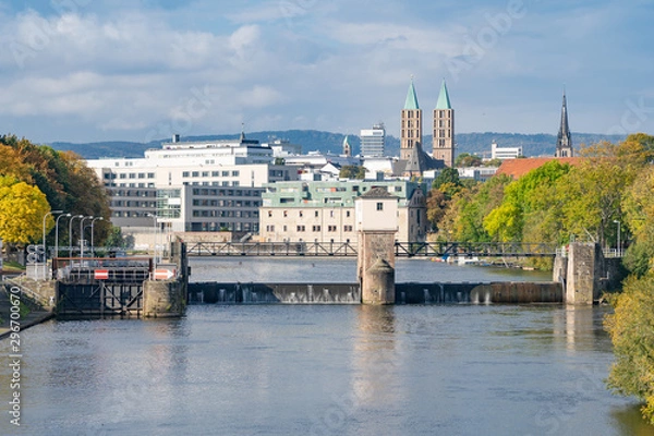 Fototapeta View over the river Fulda with its lock to the city center of Kassel, Germany, on a sunny autumn day
