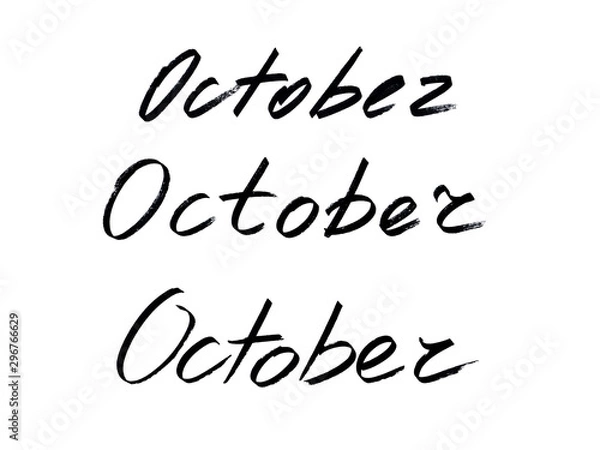 Fototapeta The hand-written inscription "October" is black isolated on white in three variants with a black marker. Grunge lettering illustration.