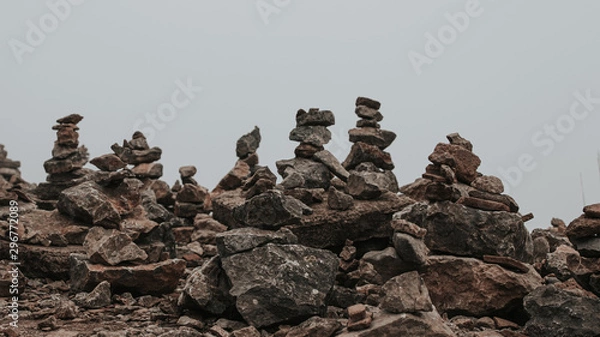 Obraz stone constructions in the form of a pyramid tower