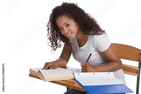 Obraz High school schoolgirl student with by desk studying