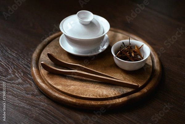 Fototapeta Tableware for tea ceremony on a wooden tray