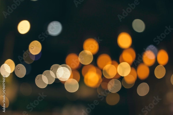 Fototapeta Abstract image of bokeh lights on cafe