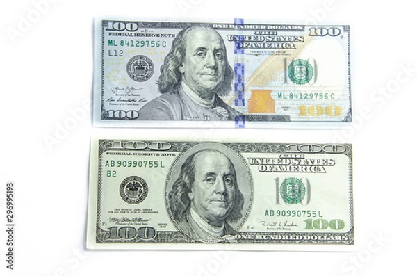 Obraz American dollars denominations of one hundred, fifty, five. Arranged in a chaotic manner, a short flight of stairs, a bill on a bill. Old sample and new notes. Dollars in hands are twisted into a tube