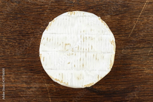 Obraz brie cheese on wooden background