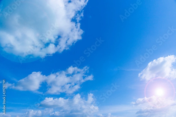 Obraz blue sky with clouds and sun