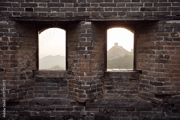 Fototapeta Views from inside a watchtower on the Jinshanling section of the Great Wall of China during sunset in Hebei Province, near Beijing.