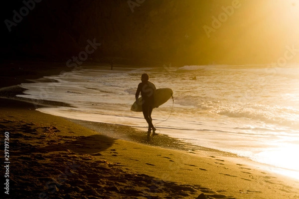 Obraz Surfer on the Beach at Sunset