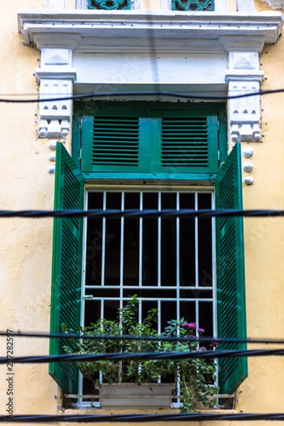 Fototapeta Old colonial window wooden architecture in Hanoi Vietnam South East Asia