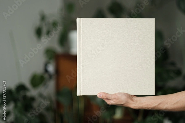 Fototapeta Mock up design templates. photo album in hand
