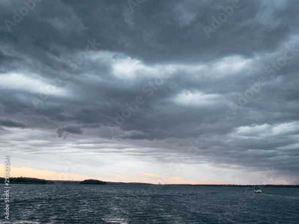 Fototapeta clouds over the sea