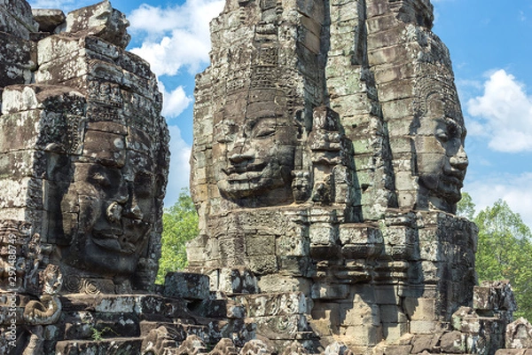 Obraz Faces carved in stone in Bayon temple towers, Angkor Wat complex, Cambodia, Siem Reap