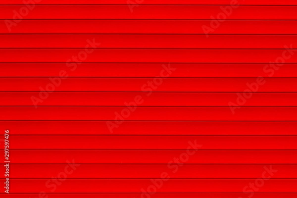 Fototapeta Abstract red texture background. Red wall background. Striped background. Colorful fence, cropped shot. 