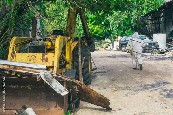 Fototapeta beekeeper walking with tools on construction site