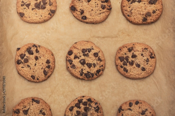 Fototapeta Homemade chocolate cookies on baking paper.