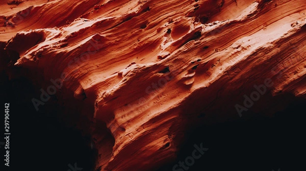 Fototapeta natural caves located on the coast with texture similar to that of natural canyones