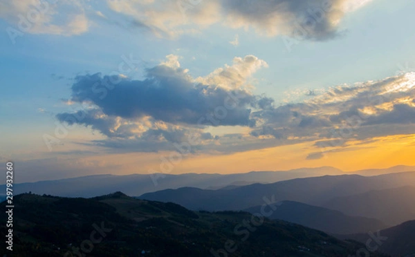 Fototapeta The mountain sunset time background