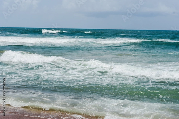 Fototapeta beach time with a colorful sea