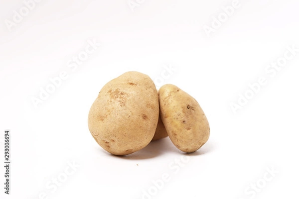 Obraz Three fresh brown potatoes raw isolated white background