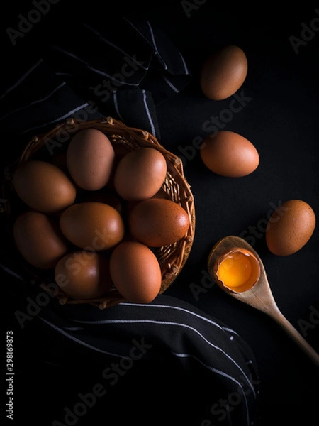 Obraz egg basket on black background
